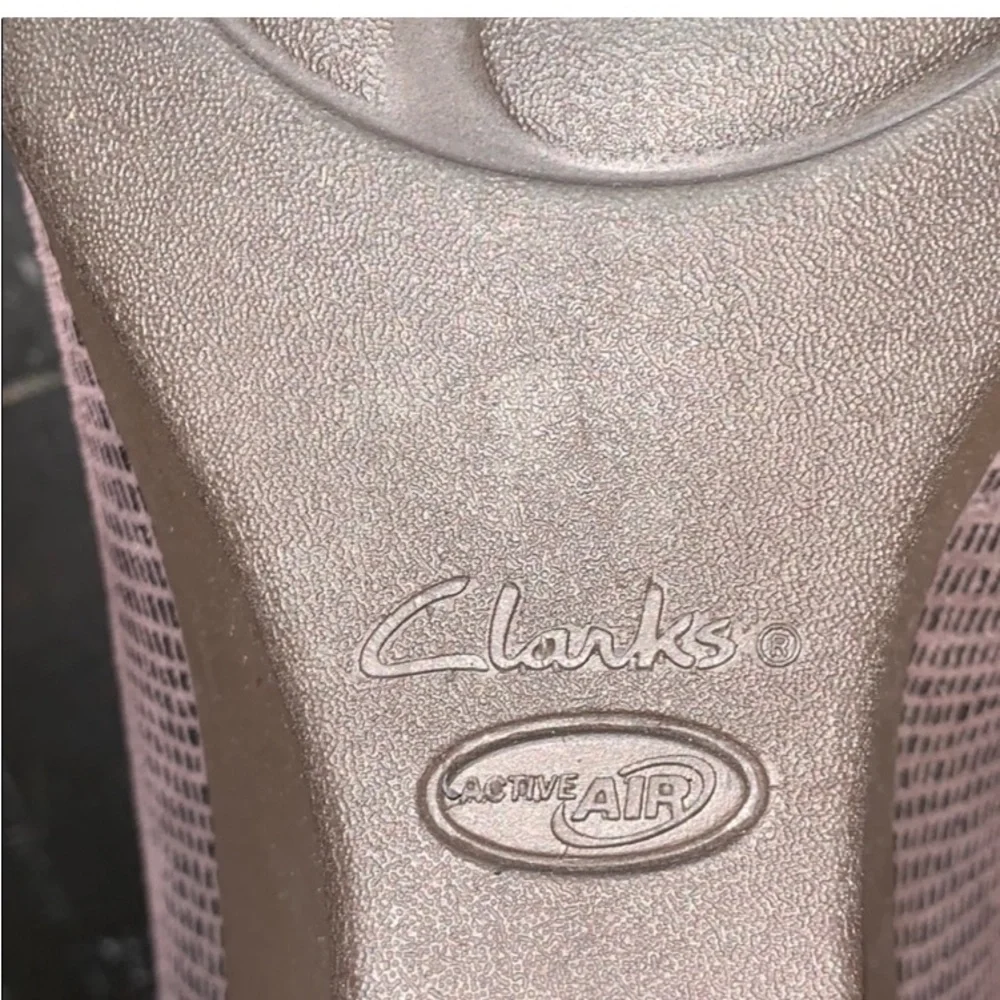Excellent Preowned Clark’s Wedge loafers Size 10M.